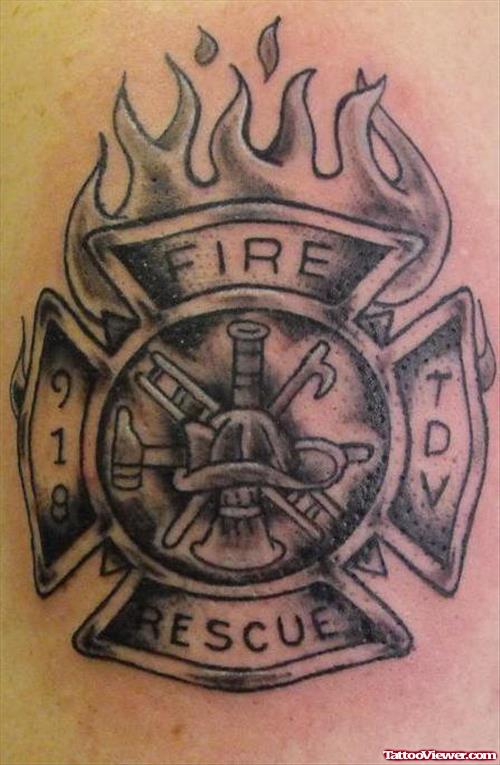 Amazing Grey Ink Falming Firefighter Tattoo