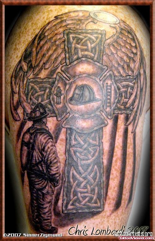 Winged Celtic Cross Firefighter Tattoo On Shoulder