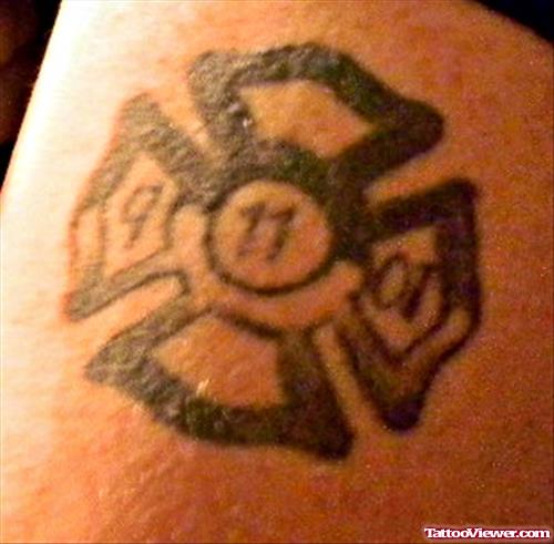 Grey Ink Firehighter Cross Tattoo