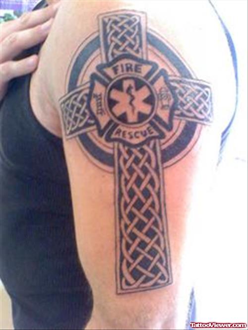 Celtic Cross And Firefighter Tattoo On Left Half Sleeve