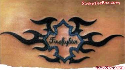 Black Ink Tribal Firehighter Tattoo On Lowerback
