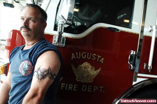 Man Left Bicep Firefighter Tattoo