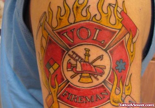 Colored Flaming Firehighter Tattoo On Shoulder