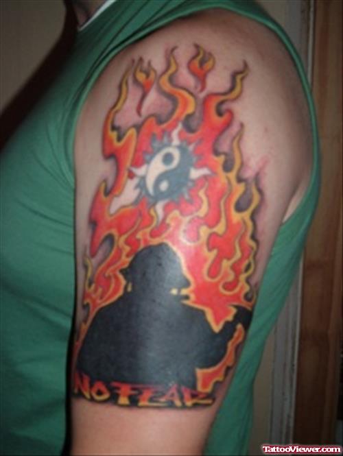 Colored Flaming Firehighter Tattoo On Left Half Sleeve