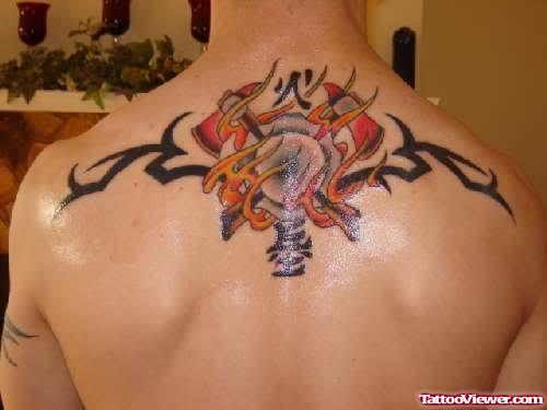 Tribal And Firefighter Tattoo On Upperback