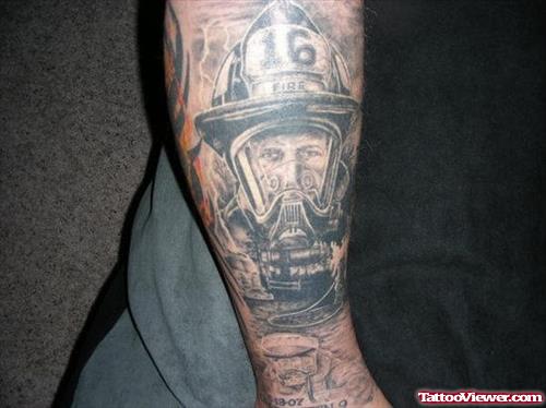 Grey Ink Firefighter Tattoo On Man Right Sleeve