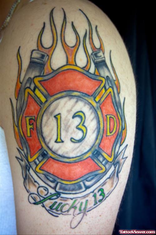 Flaming Firehighter Tattoo On Left Shoulder