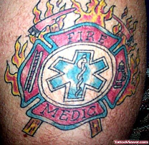 Flaming Colored Firefighter Tattoo