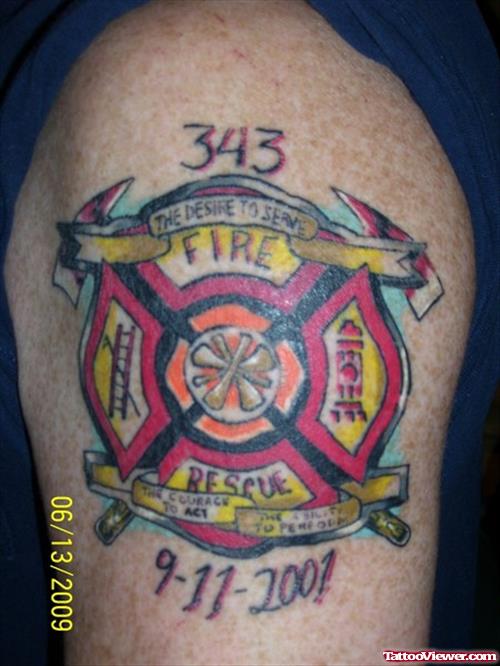 Colored Firefighter Tattoo On Left Shoulder