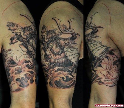 Grey Ink Firehighter Tattoo On Left Bicep