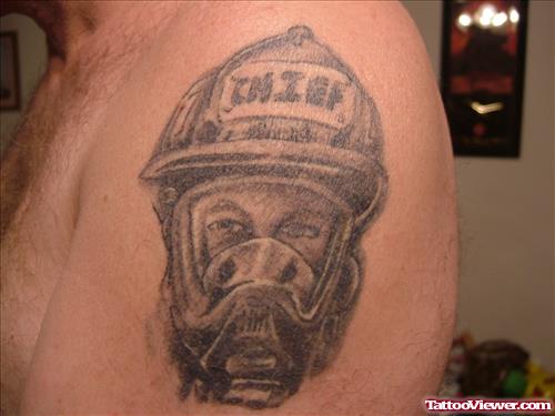 Fire Fighter Face Tattoo On Back