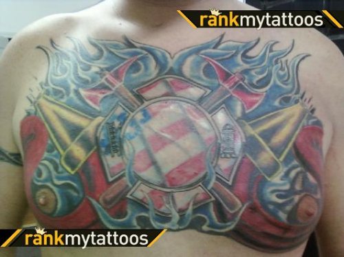 Awesome Color Ink Firefighter Tattoo On Man Chest