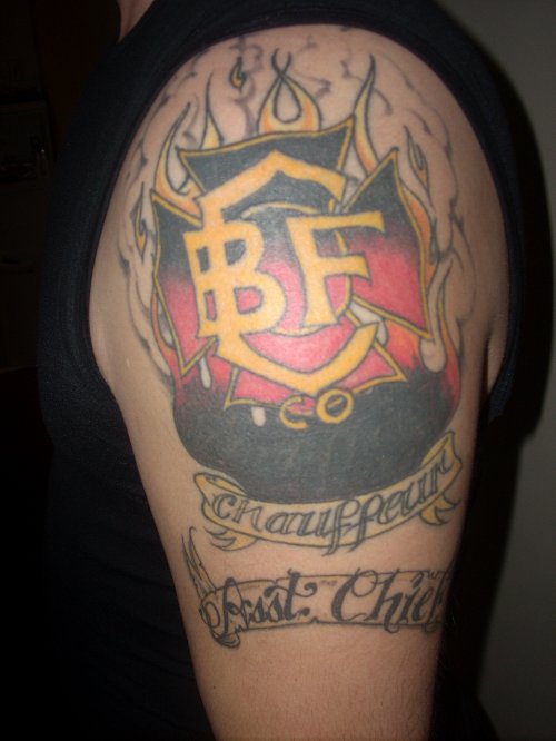Colored Firefighter Tattoo On Shoulder