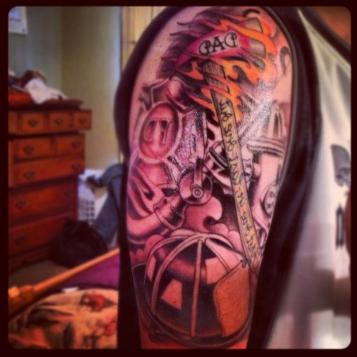 Firehighter Tattoo On Right Half Sleeve