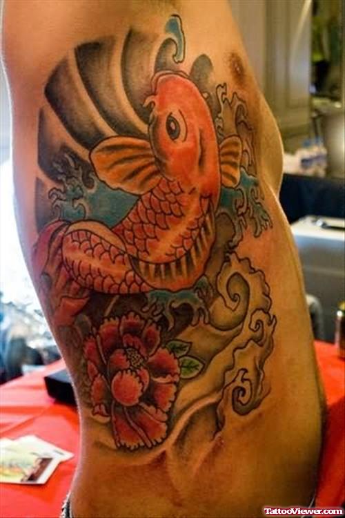 Beautiful Fish Tattoo On Side Rib