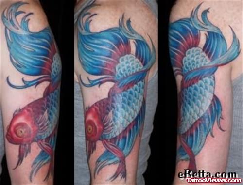 Blue Fish Tattoo On Bicep