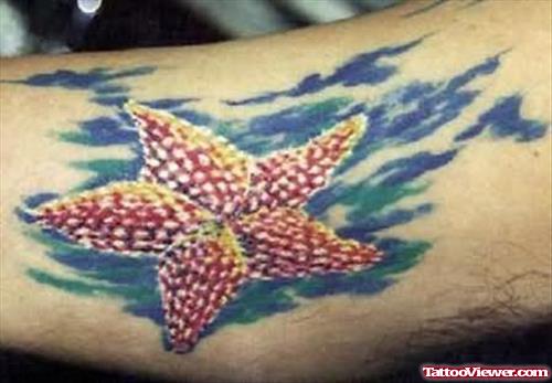 Tempting Star Fish Tattoo On Muscle