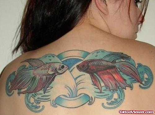 Delightful Fishes Tattoo On Back