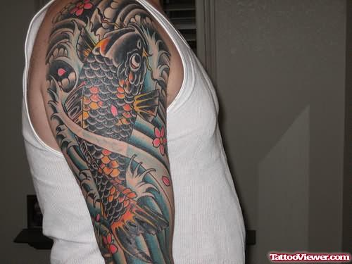 Black Koi Fish Tattoo On Sleeve