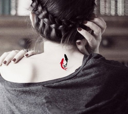 Red And Black Fish Tattoos On Girl Nape