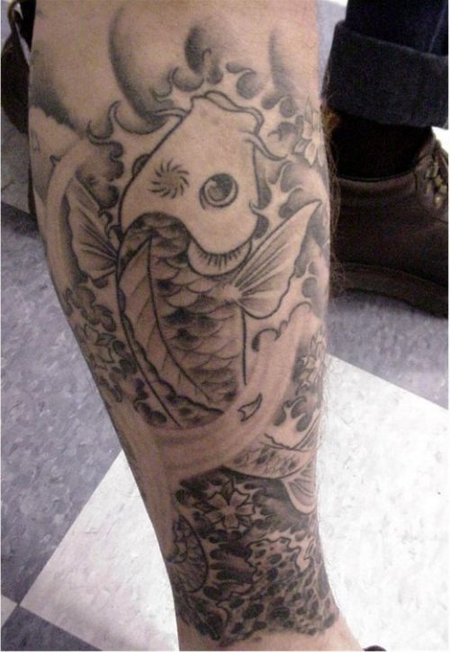 Grey Ink Fish Tattoo On Right Leg