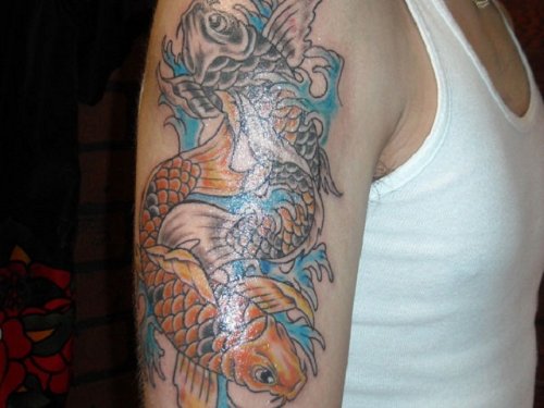 Color Ink Fish Tattoo On Right Half Sleeve
