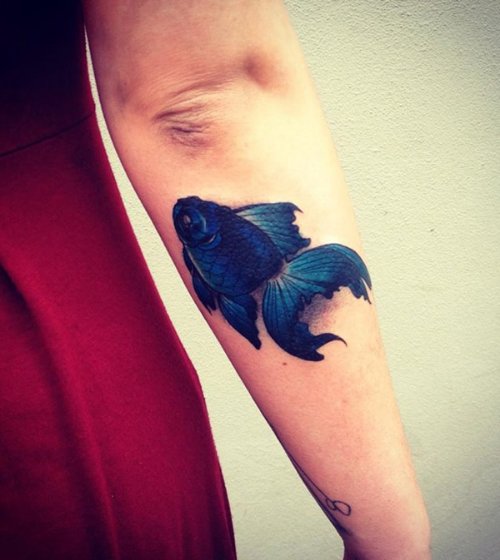 Blue Ink Fish Tattoo On Right Arm