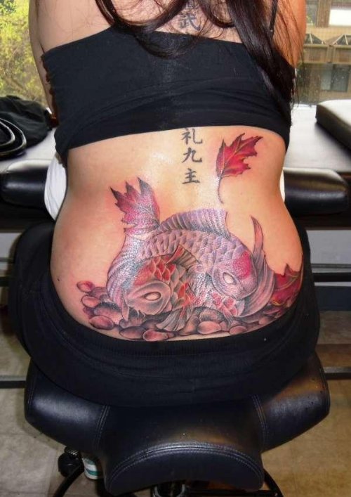 Leaves And Fish Tattoo on Lowerback