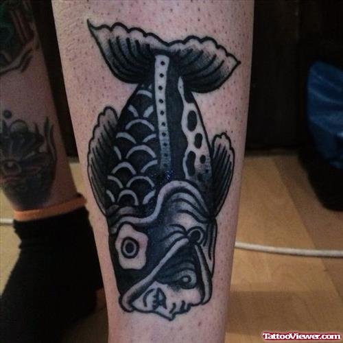fish with head girl tattoo