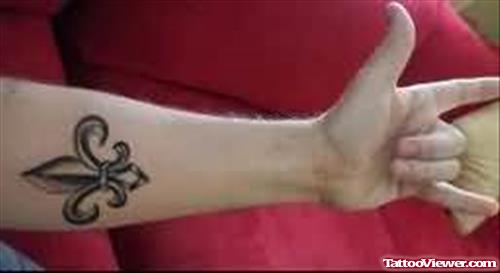 Fleur De Lis Sybol Tattoo On Arm