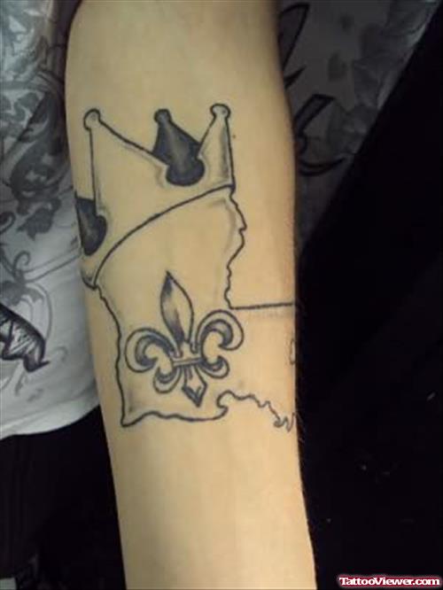 Omar Fleur De Lis Tattoo On  Arm