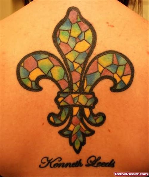 Fleur De Lis Coloured Tattoo On Back