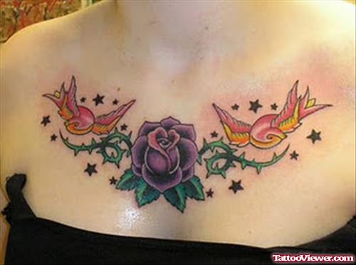 Sparrow And Floral Tattoo On Chest