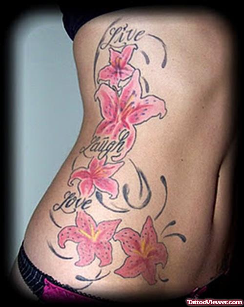 Girls Flower Tattoos on Side of Ribs