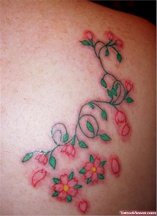 Beautyful Tiny Flowers Tattoo On Back