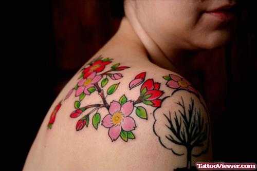 Attractive Floral Tattoo On Back