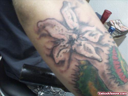 Grey Ink Flower Tattoo On Sleeve