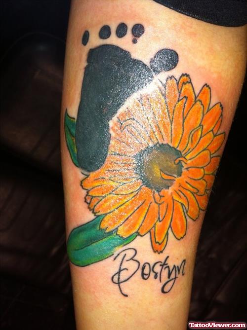 Yellow Flower And Footprint Tattoo