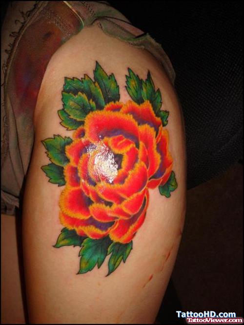 Flower Tattoo On Left Thigh