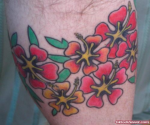 Colored Red Flower Tattoos On Leg