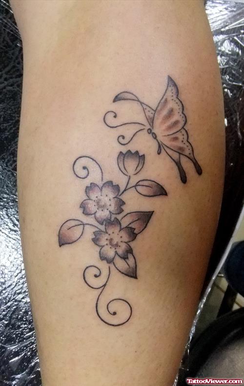 Butterfly And Flower Tattoos On Leg