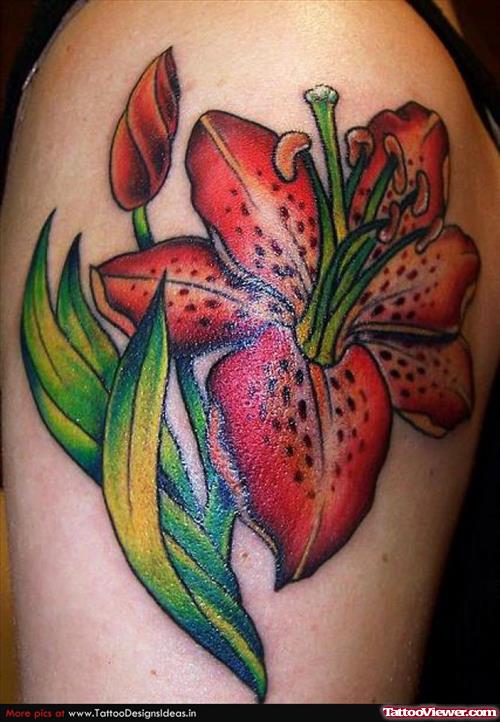 Red Lily Flower Tattoo On Left Shoulder