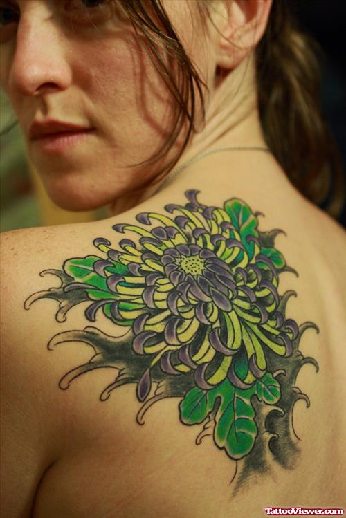 Green Ink Flower Tattoo On Back Shoulder