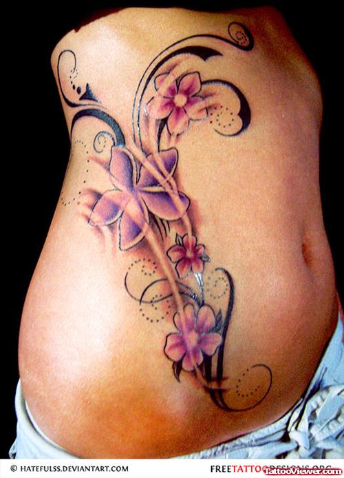 Attractive Rib Side Flower Tattoo
