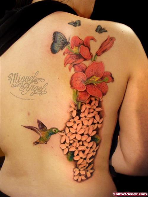 Lily And Jasmine Flowers Tattoos On Back