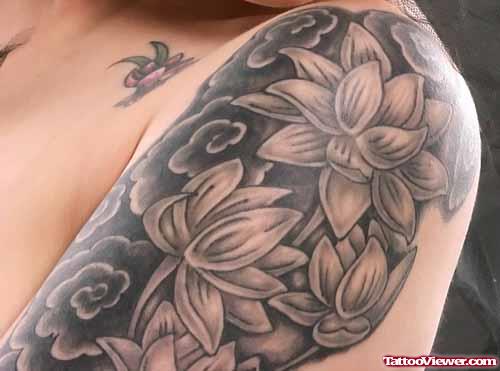 Grey Ink Flower Tattoos On Left Half Sleeve