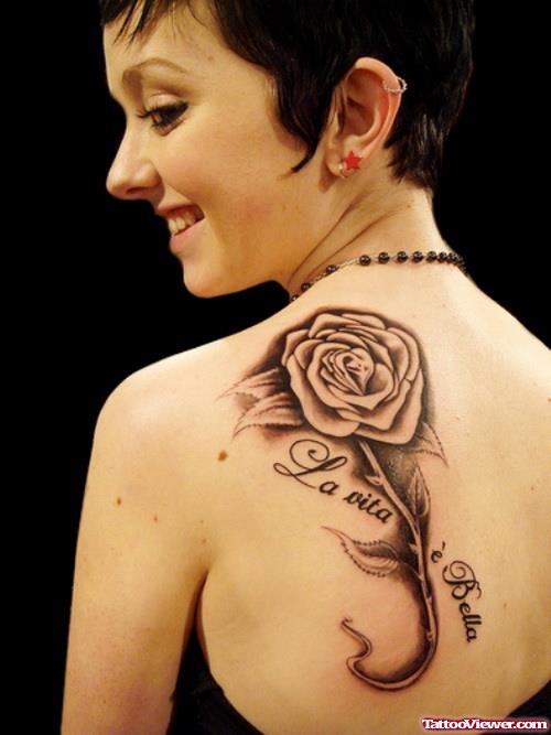 Grey Ink Flower Tattoo On Back Shoulder