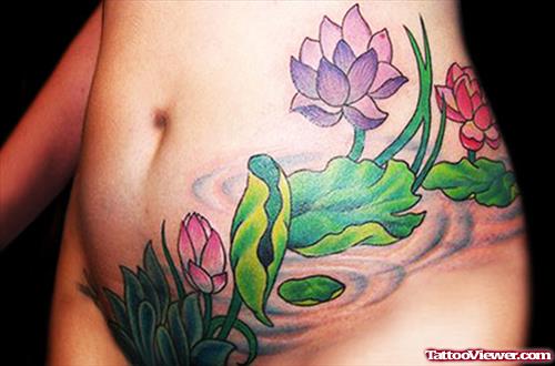 Colored Flowers Tattoos On Hip
