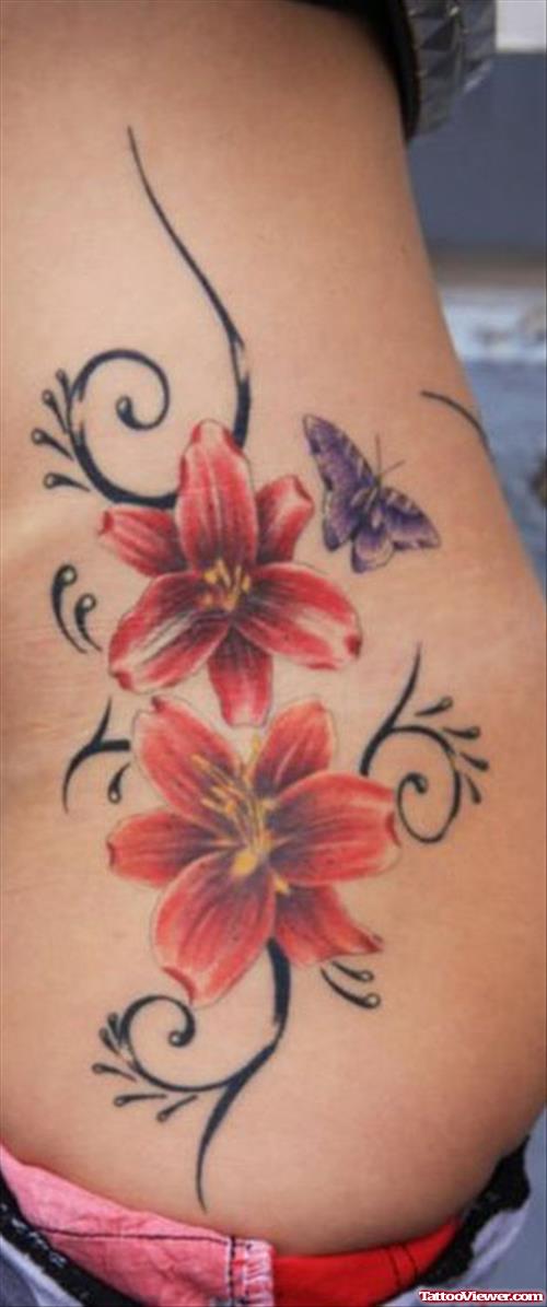 Tribal And Flower Tattoo On Side