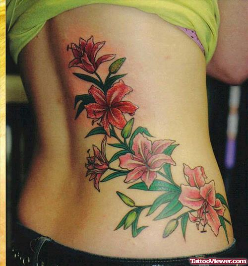 Red Lily Flowers Tattoos On Rib
